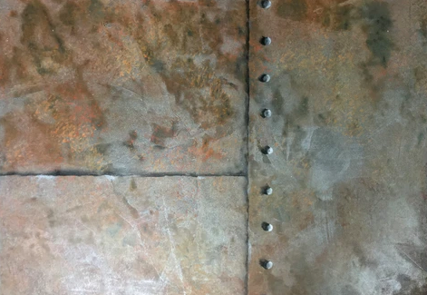 Metallic Wall Finishes for Branding and Design: Rusted Steel With Rivets